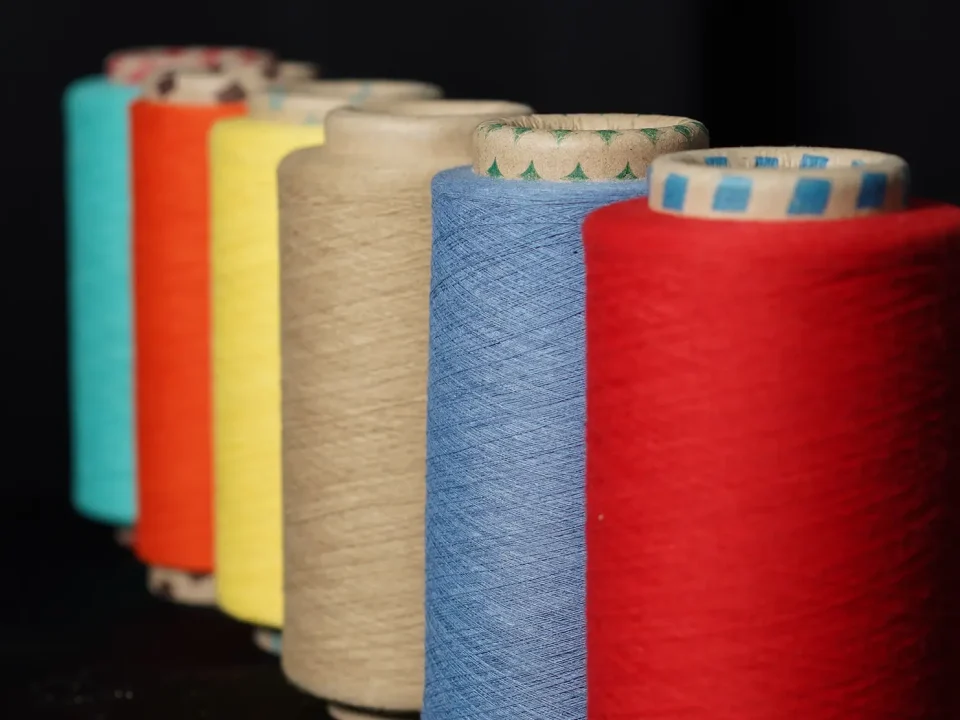 A Critical Step for Sustainable Fashion: Water Conservation with Colored Recycled Yarns